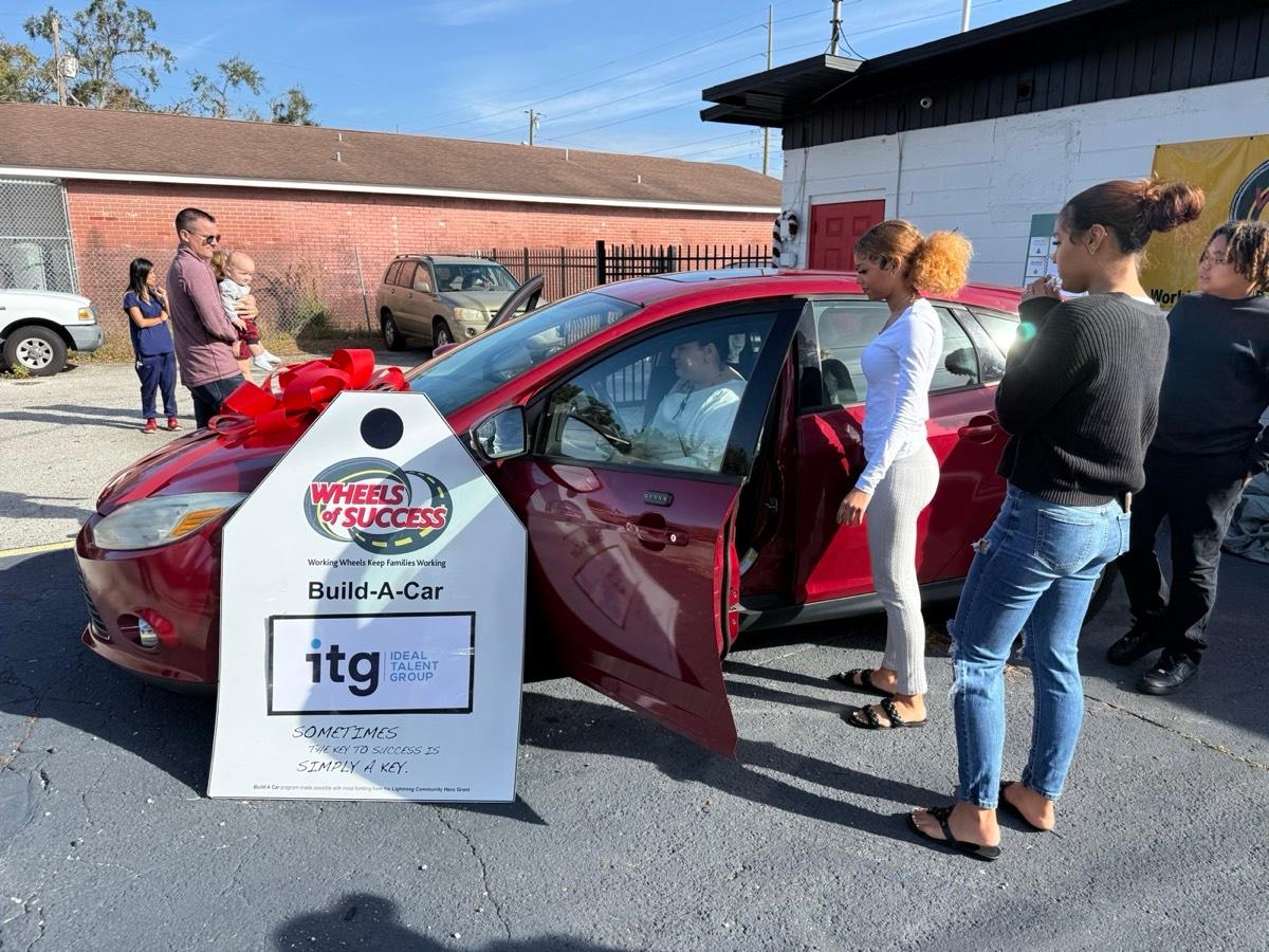 ITG sponsors a car for a working family through Wheels of Success